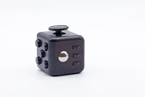 A cube with buttons and other things to reduce stress Foto stock