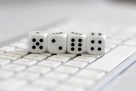 Cube on a keyboard Stock Photos