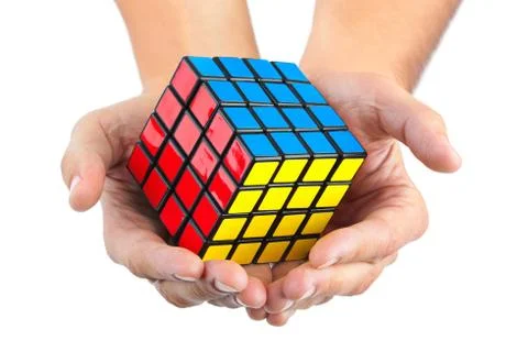 Cube puzzle in hands Stock Photos
