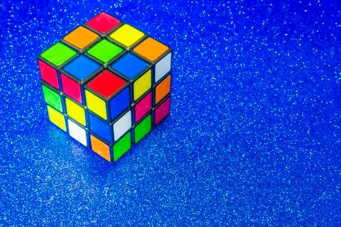 Cube Rubik on a blue background Stock Photos