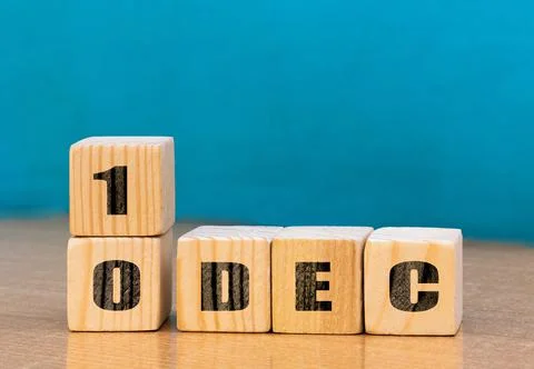 Cube shape calendar for December 10 on wooden surface with empty space Stock Photos