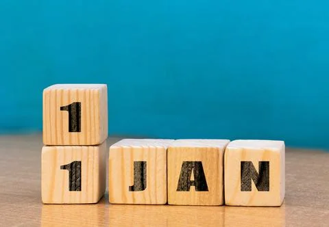 Cube shape calendar for January 11 on wooden surface with empty space Foto stock