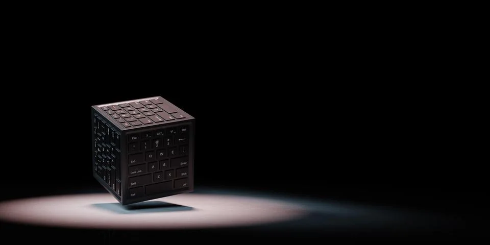 Cube Shape with Computer Keyboard on Faces Spotlighted on Black Background wi Stock Illustration