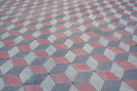 Cube shape hexagon background in city park paving Stock Photos