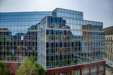 Cube shape rooftop of modern corporate building with mirrored glass wall and  Stock-Fotos