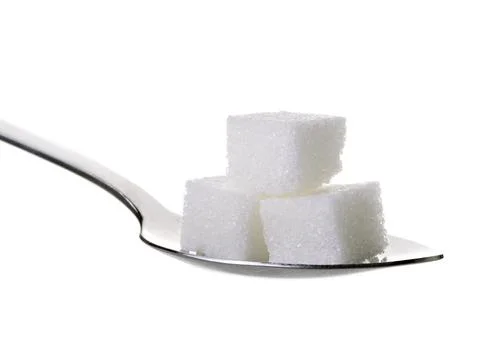 Cube sugars in teaspoon isolated on white background Stock Photos
