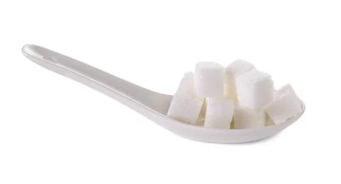 Cube sugars in white spoon isolated on white background Stock Photos
