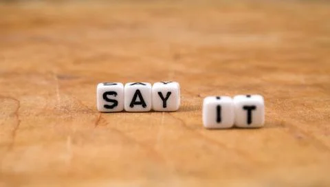 Cube words on the wooden table Stock Photos