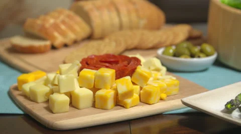 Cubed Cheese Rack Focus Crackers Stock Footage 64974080