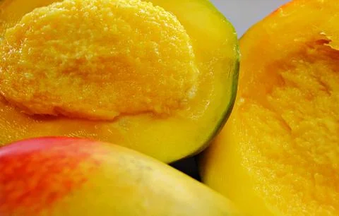 Cubed mango background, close-up, mango background, top view Stock Photos