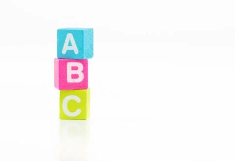 Cubes with alphabets a, b and c arranged one upon the other Foto stock