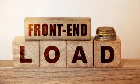 Cubes and dice with Front end load on wooden backround. Debt load financial c Photos