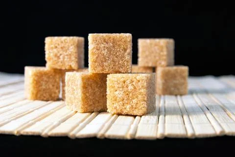 Cubes of cane sugar Stock Photos