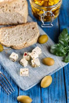 Cubes of cheese Stock Photos