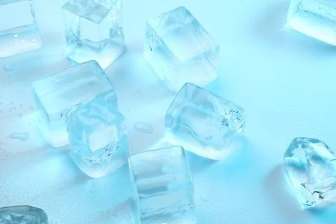 Cubes of clear ice on light blue background, closeup Foto stock