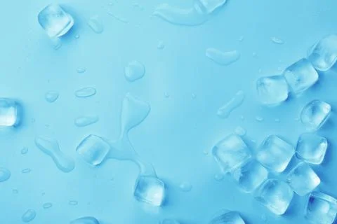 Cubes of clear ice on light blue background, flat lay 스톡 사진