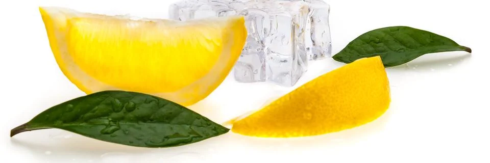 Cubes of cold ice, two slices of fresh yellow lemon and green leaves on white Stock Photos