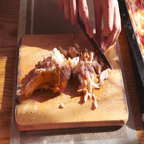 Cubes cut cooked meat on the board Stock Footage