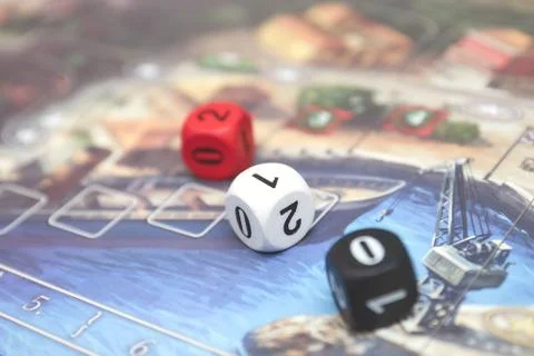 Cubes with the game on the table. themed Board games. vertical view of the Bo Foto stock
