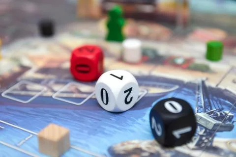 Cubes with the game on the table. themed Board games. vertical view of the Bo Stock Photos
