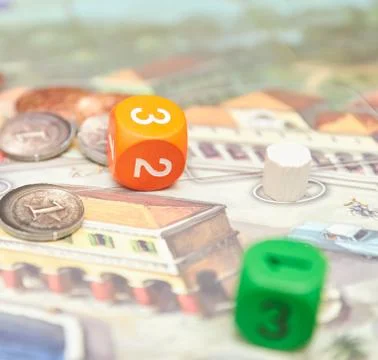Cubes with the game on the table. themed Board games. vertical view of the Bo Stock Photos