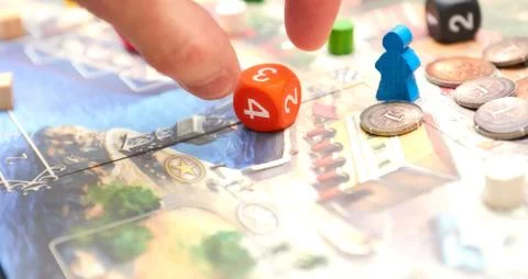 Cubes with the game on the table. themed Board games. vertical view of the Bo Stock Photos