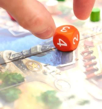 Cubes with the game on the table. themed Board games. vertical view of the Bo Foto stock