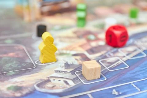 Cubes with the game on the table. themed Board games. vertical view of the Bo Stock Photos