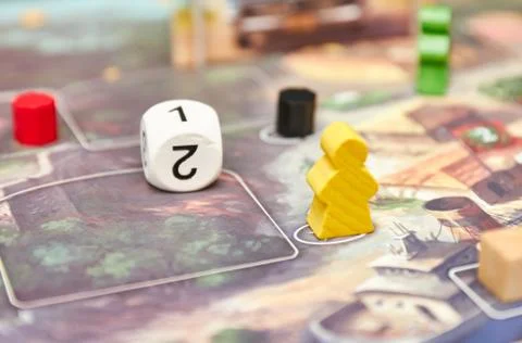 Cubes with the game on the table. themed Board games. vertical view of the Bo Stock Photos