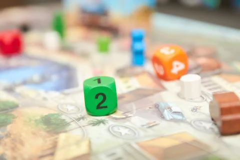 Cubes with the game on the table. themed Board games. vertical view of the Bo Stock Photos
