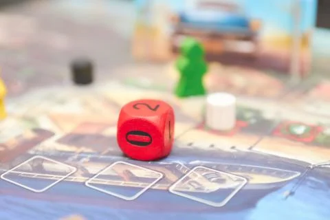 Cubes with the game on the table. themed Board games. vertical view of the Bo Stock Photos