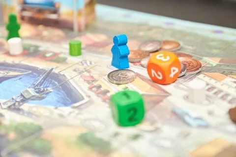 Cubes with the game on the table. themed Board games. vertical view of the Bo Stock Photos