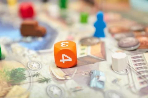 Cubes with the game on the table. themed Board games. vertical view of the Bo Stock Photos