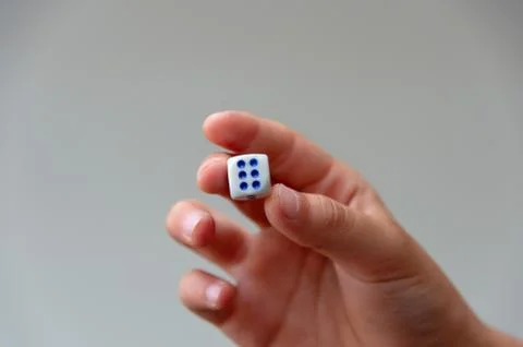 Cubes in hand for gambling Stock Photos