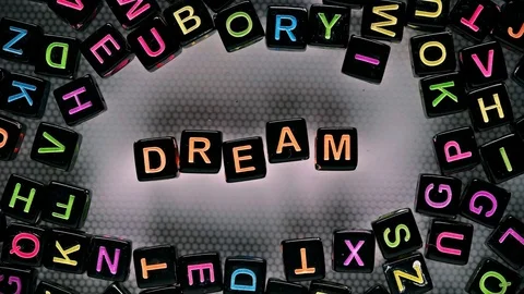 Cubes with letters have collected a word - dream Stock Footage 79307795
