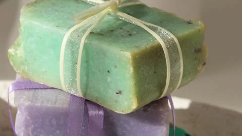 Cubes of natural soap against backdrop of natural elements. Handicrafts and 動画素材 318839162