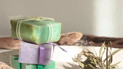Cubes of natural soap against backdrop of natural elements. Handicrafts and 스톡 동영상 318839179