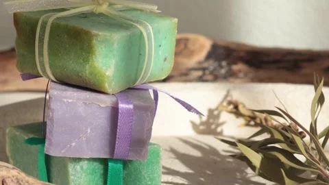 Cubes of natural soap against backdrop of natural elements. Handicrafts and 스톡 동영상 319030832