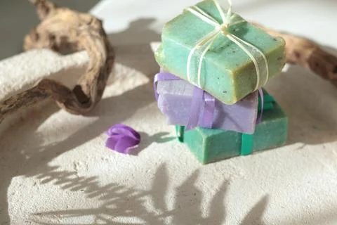 Cubes of natural soap against backdrop of natural elements. Handicrafts and 写真素材