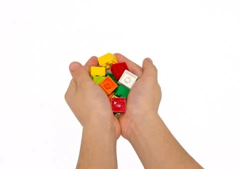 Cubes in the palms Stock Photos