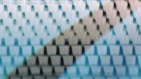 Cubes reflected in water in swimming pool defocused Stock Footage 234319408