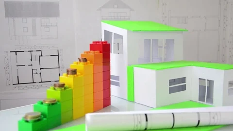Cubes symolize energy classes, money and model of house. Energy saving. Stock Footage 70164380