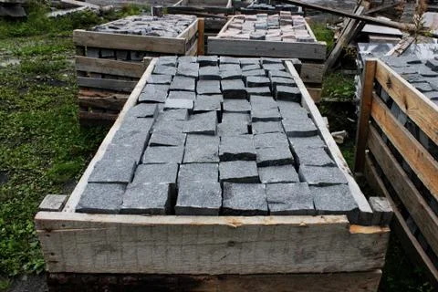 Cubic billets made of marble made near the canyon in the stone processing pla Stock Photos