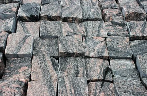 Cubic billets made of marble made near the canyon in the stone processing pla Stock Photos
