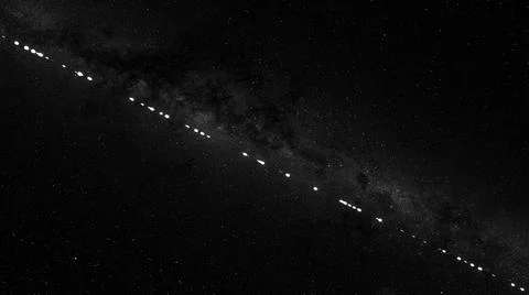 Cubsats are launched into space using a rocket, view from space on the process Stockfoto's