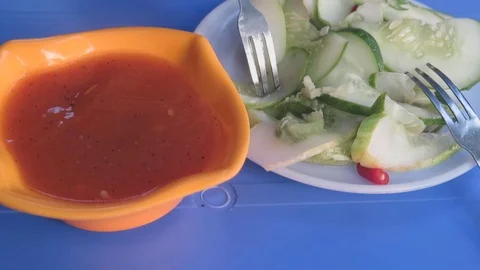 Cucumber and chutney Stock Footage 70539037