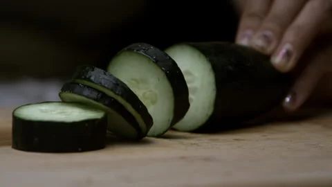 Cucumber Being Diced in Super Slow Motion Stock Footage 270407372