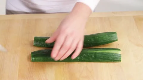 A cucumber being sliced Stock-Footage 24655269