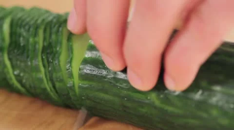 Cucumber being sliced Stock Footage 24664436