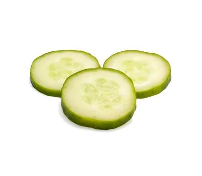 The cucumber cut by circles on a white background Stock Photos